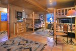 Oversized bunk room with custom log bunkbeds